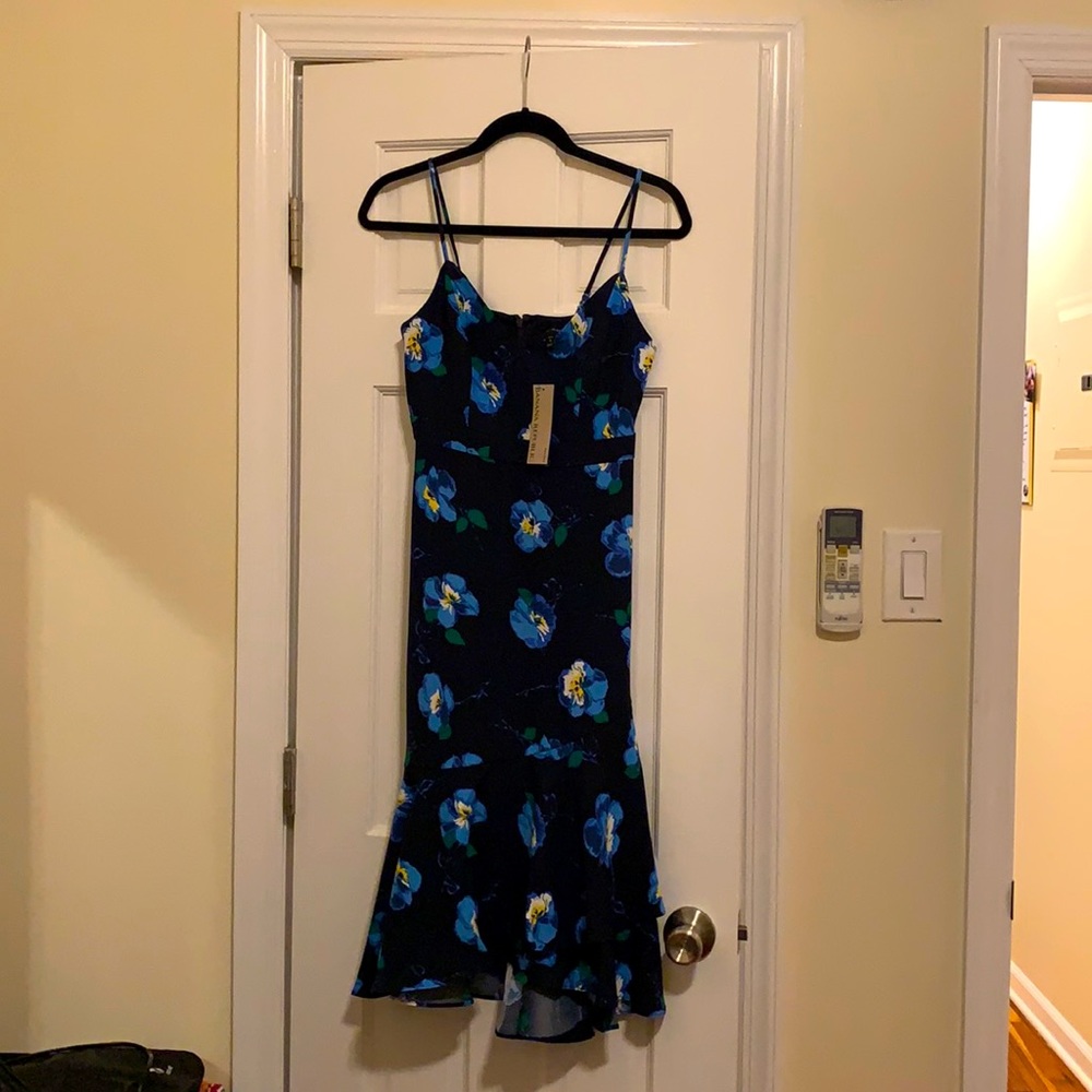 Navy floral dress. Light comfy fabric. Adjustable straps.